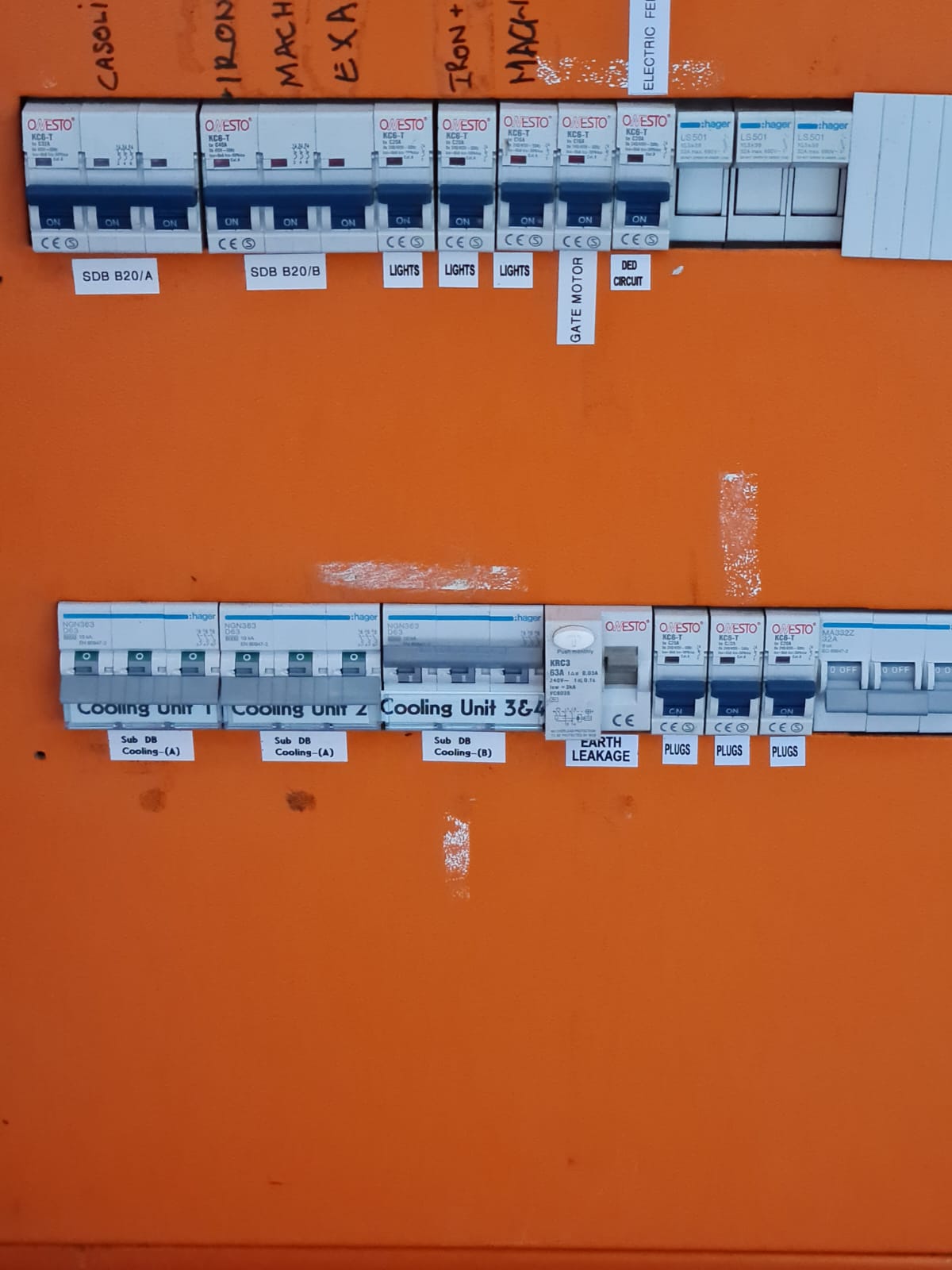 Newly installed orange distribution board at City Produce with clearly labelled breakers for cooling units, plugs, lights and gate motor